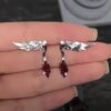 Sylus Vintage Red Zircon Brushed Wing Titanium Steel Stud Earrings | Love and Deepspace